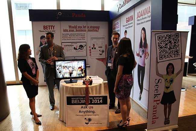 Founders Matt Conger, W’06 (right) and Phil Kohn man their booth at the forum.