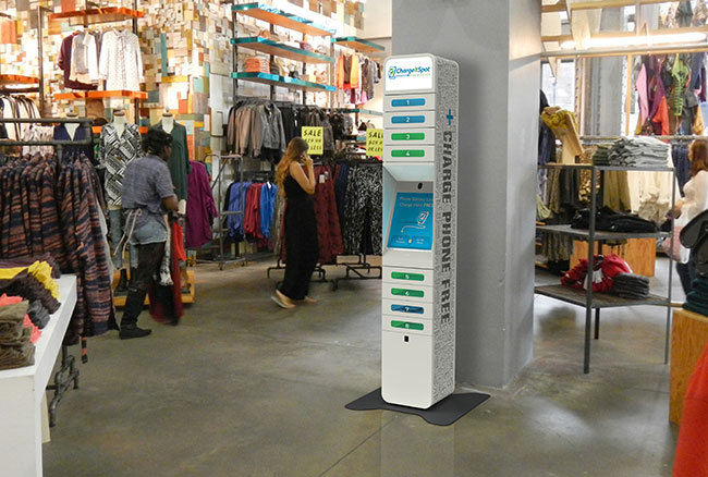 A ChargeItSpot device in action at an Urban Outfitter store.