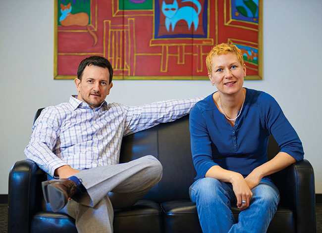 Alex Krooglik and Laura Bennett, co-founders of Embrace Pet Insurance, have a paw up on the competition. Photo credit: Todd Biss.